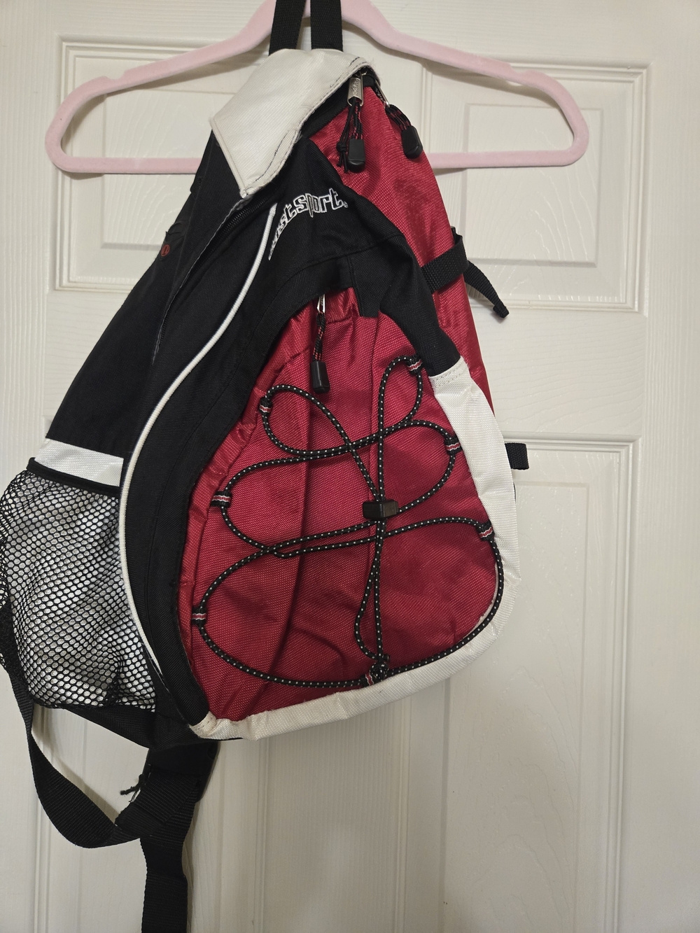 Eastsport Red and Black Sling Backpack with White Trim